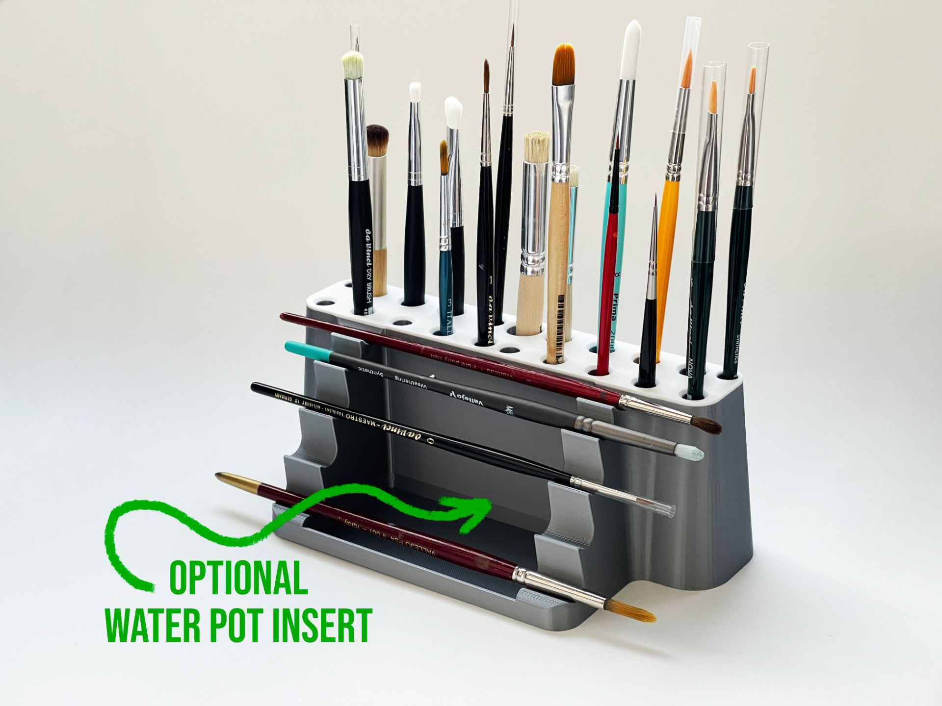 Vaciabolsillos impreso en 3D con compartimentos organizadores sobre una mesa clara