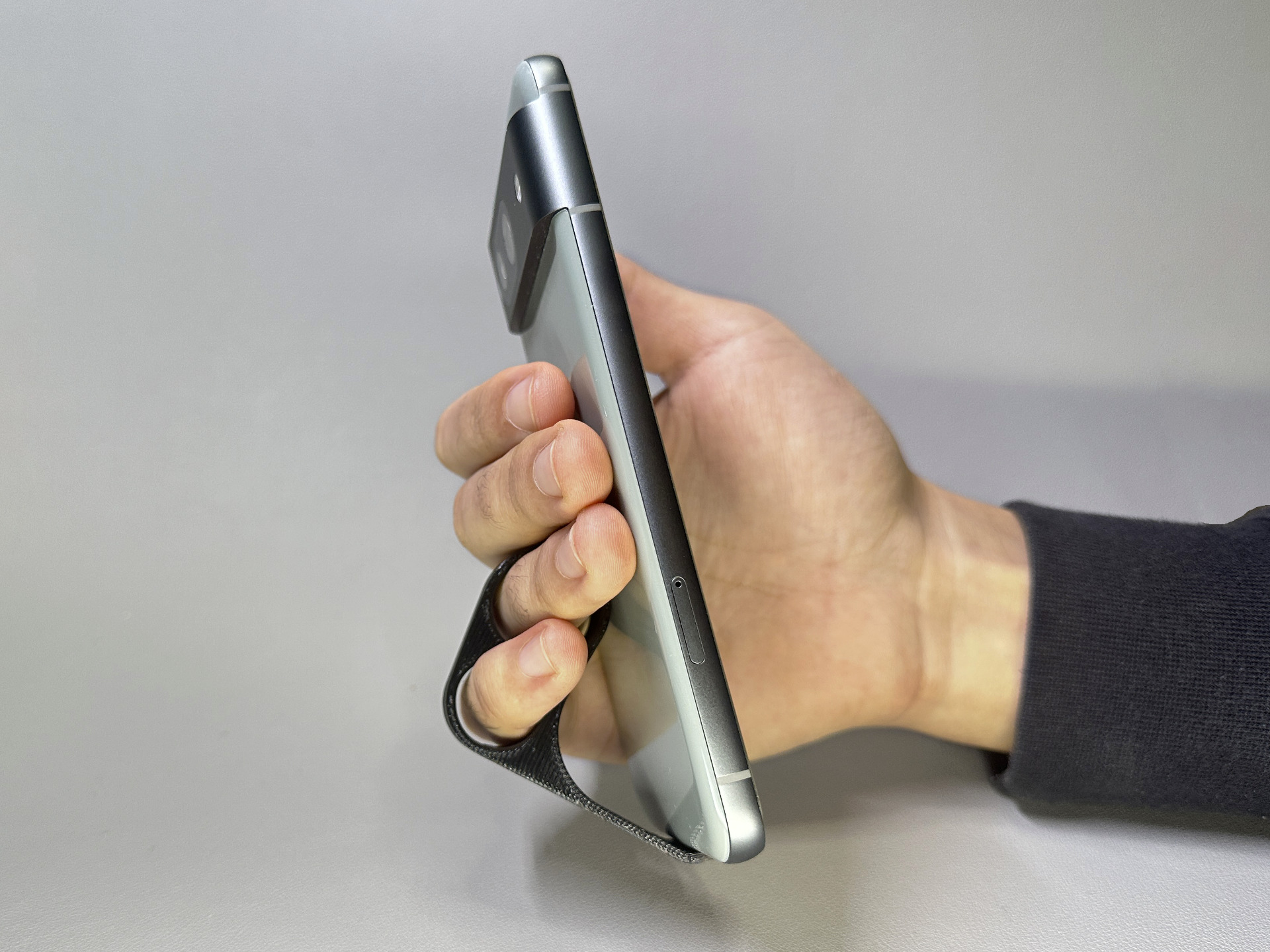 Soporte de móvil meñique 2